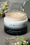 Lumazen Anti-Aging Edelweiss Day Cream, open 50 ml jar on grey stone